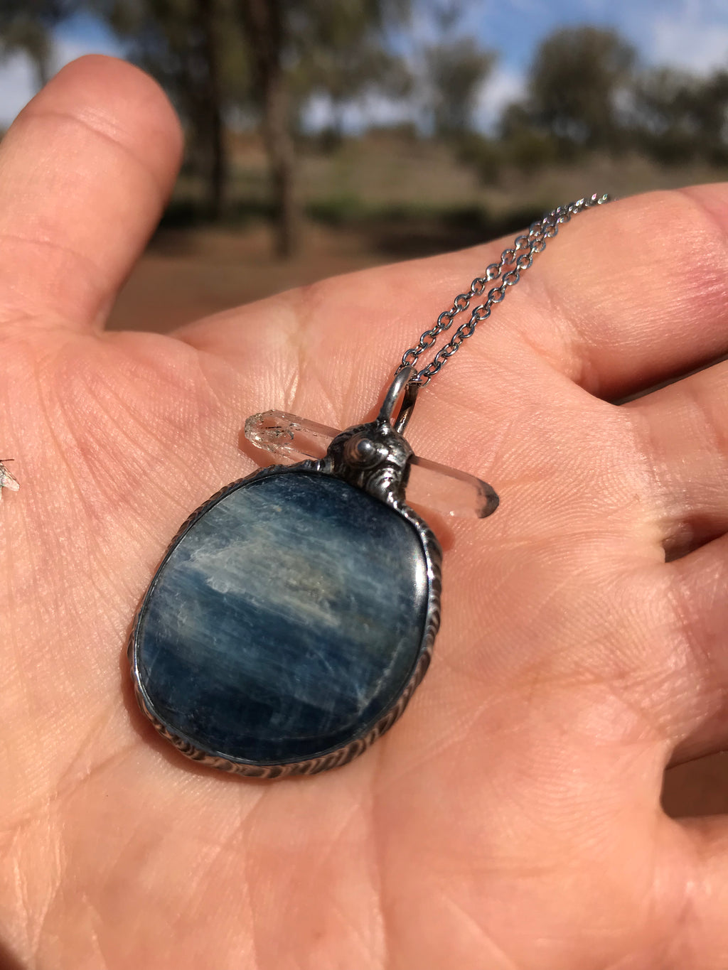 Blue polished Kyanite and clear Quartz
