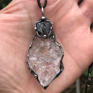 Rough Clear Quartz pendant with mineral inclusion and rainbow adorned with Australian Garnet♥️