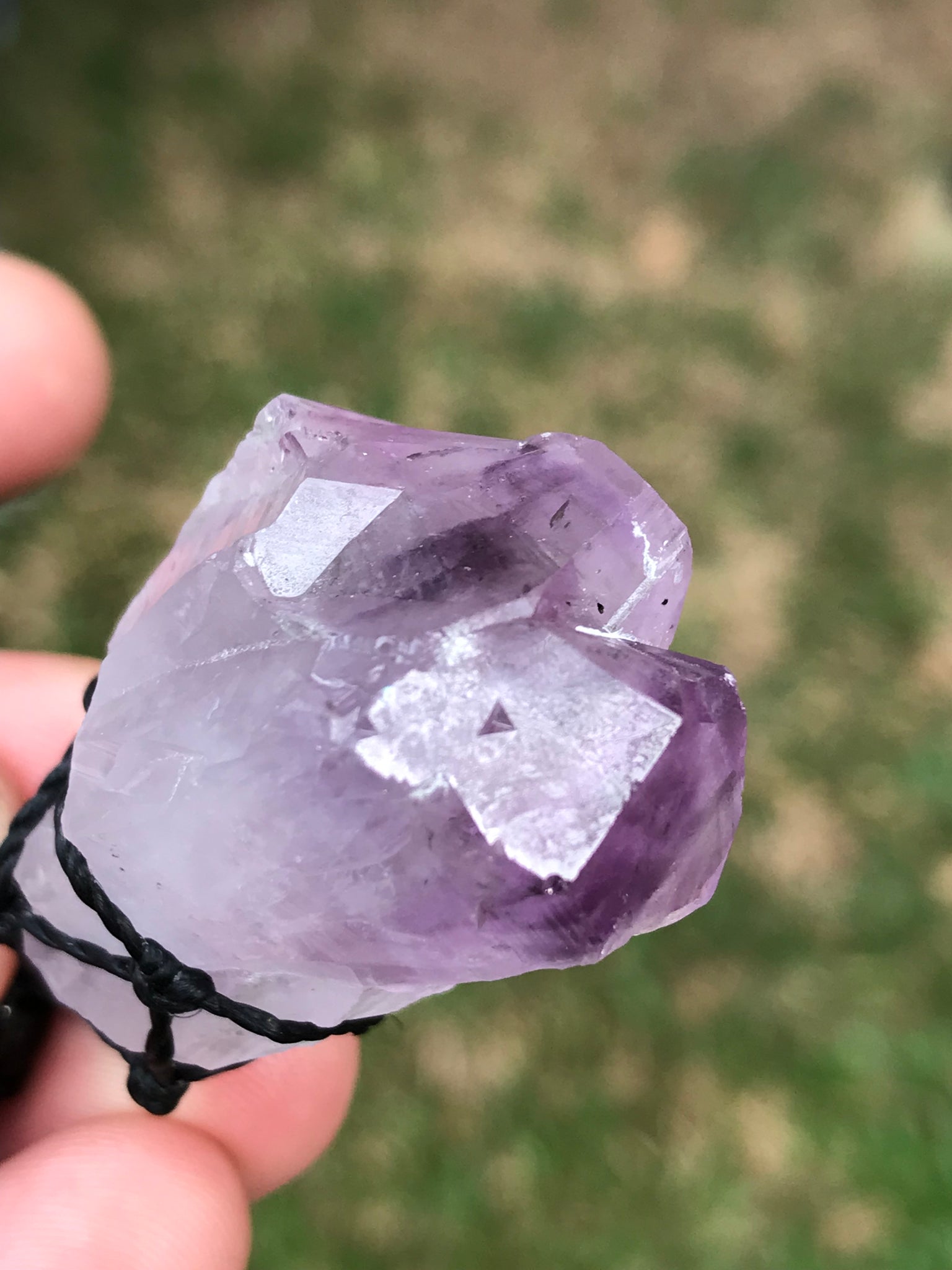 Rough Amethyst Point and black onyx wrapped in Linhasita