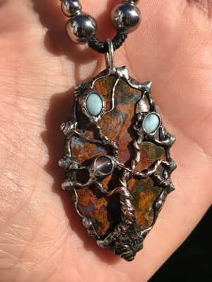 Twisted tree on brecciated jasper adorned with larimar and moonstone….tigereye in the strap