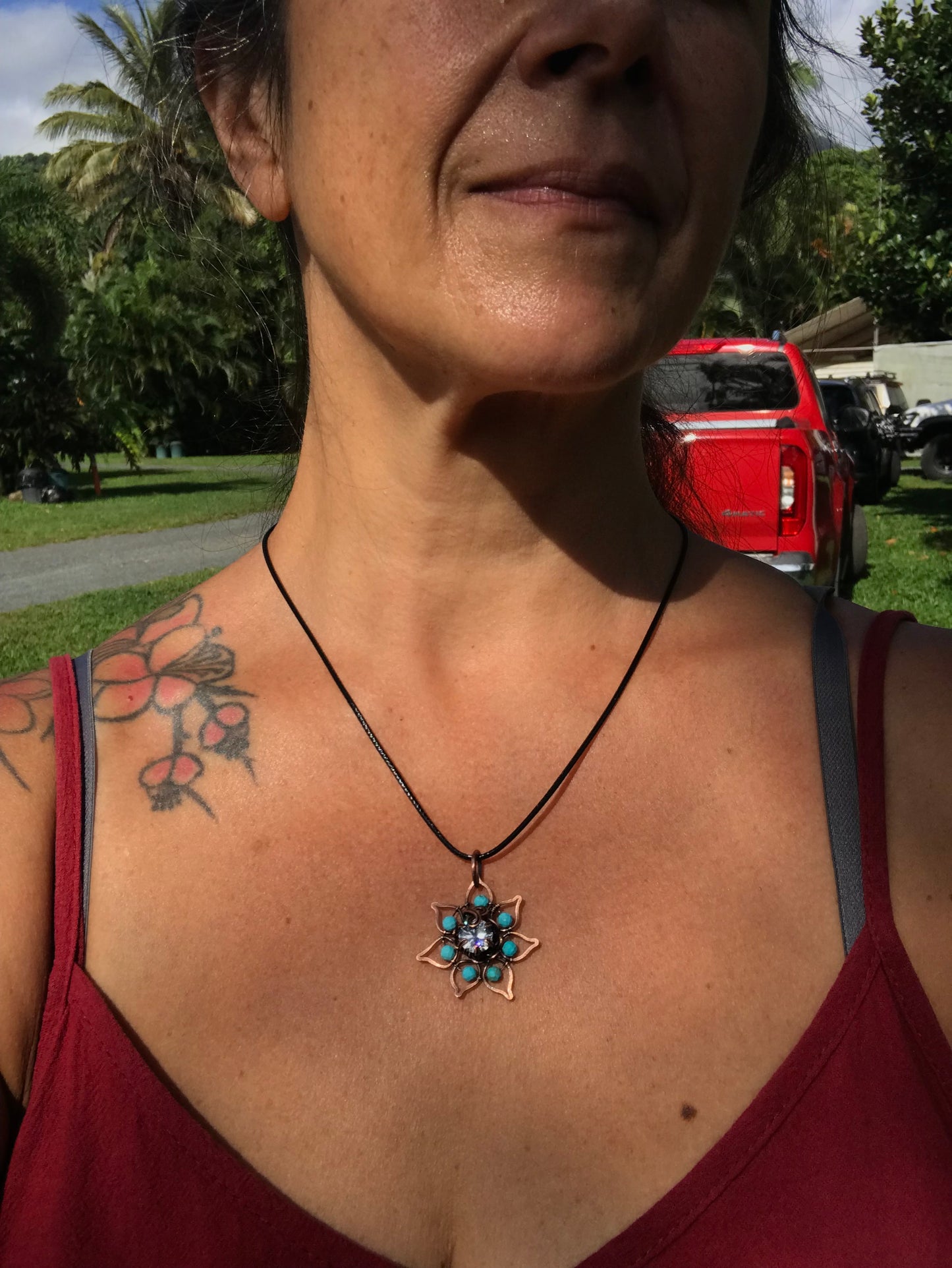 Copper crafted lotus flower pendant with Turquoise