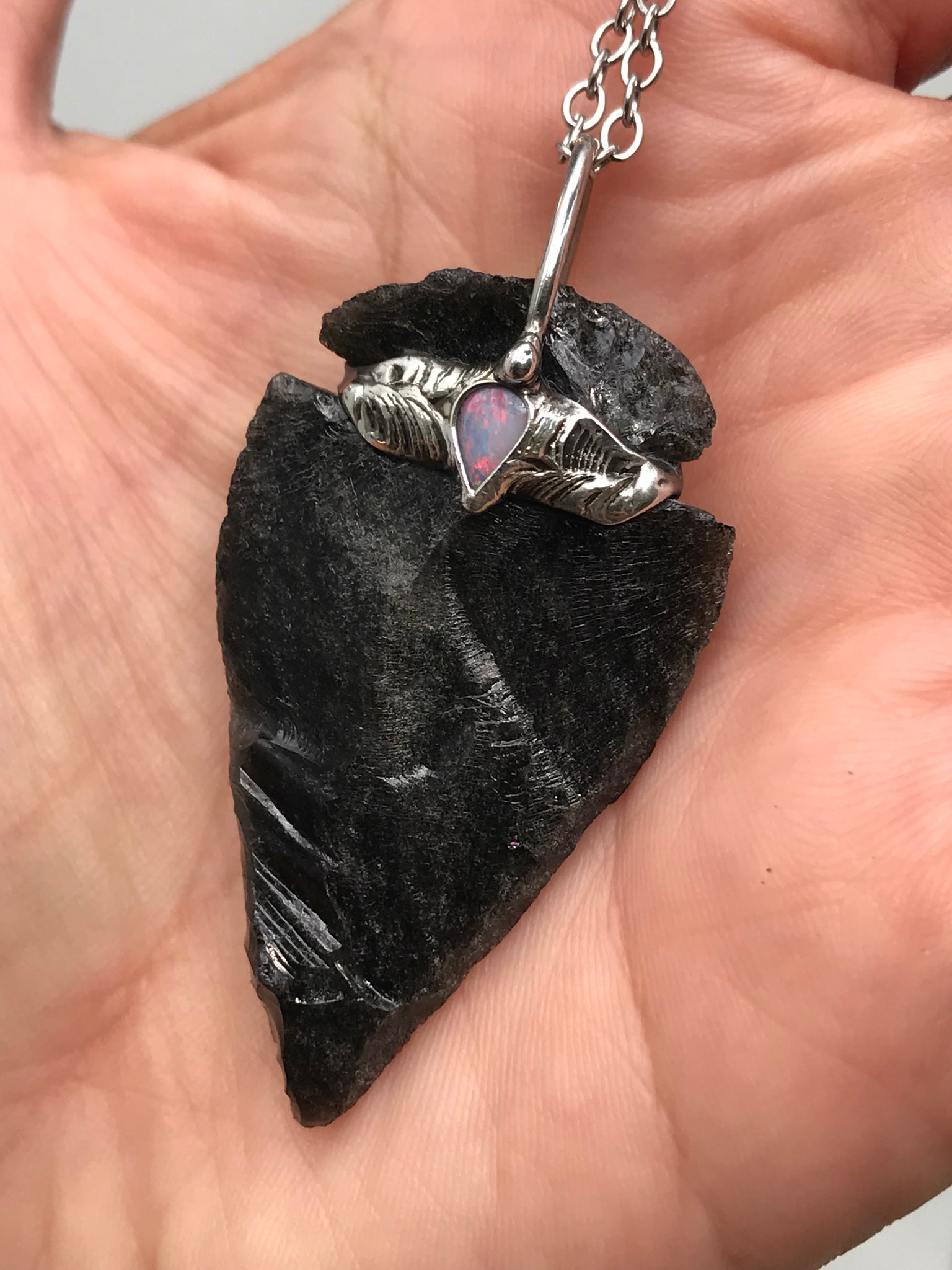 Silversheen Obsidian Arrowhead adorned with lightning ridge Opal