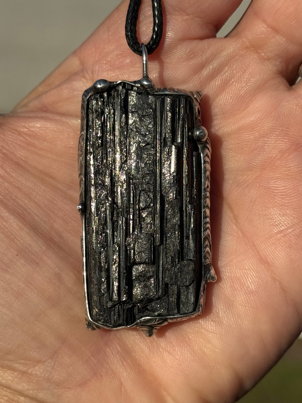 Black striated Tourmaline pendant