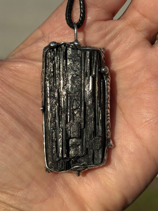 Black striated Tourmaline pendant