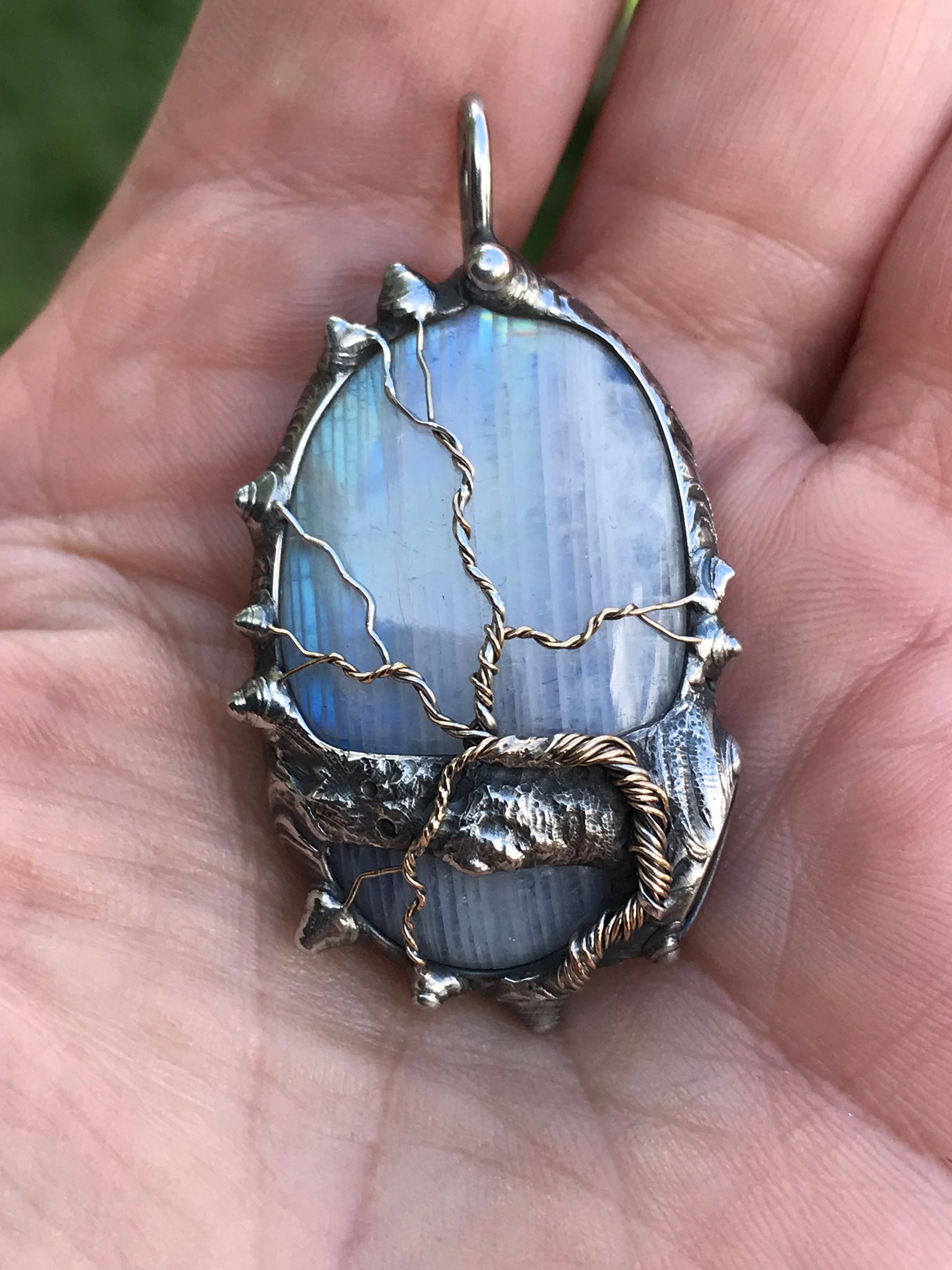 Rainbow Moonstone adorned with gold and sterling silver tree of life
