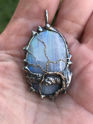 Rainbow Moonstone adorned with gold and sterling silver tree of life