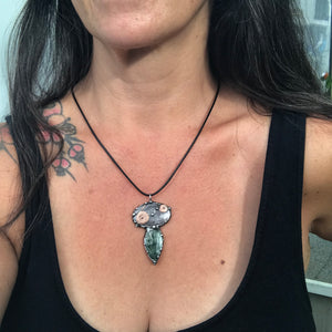 Double spiralled Hypersthene and Seraphinite pendant