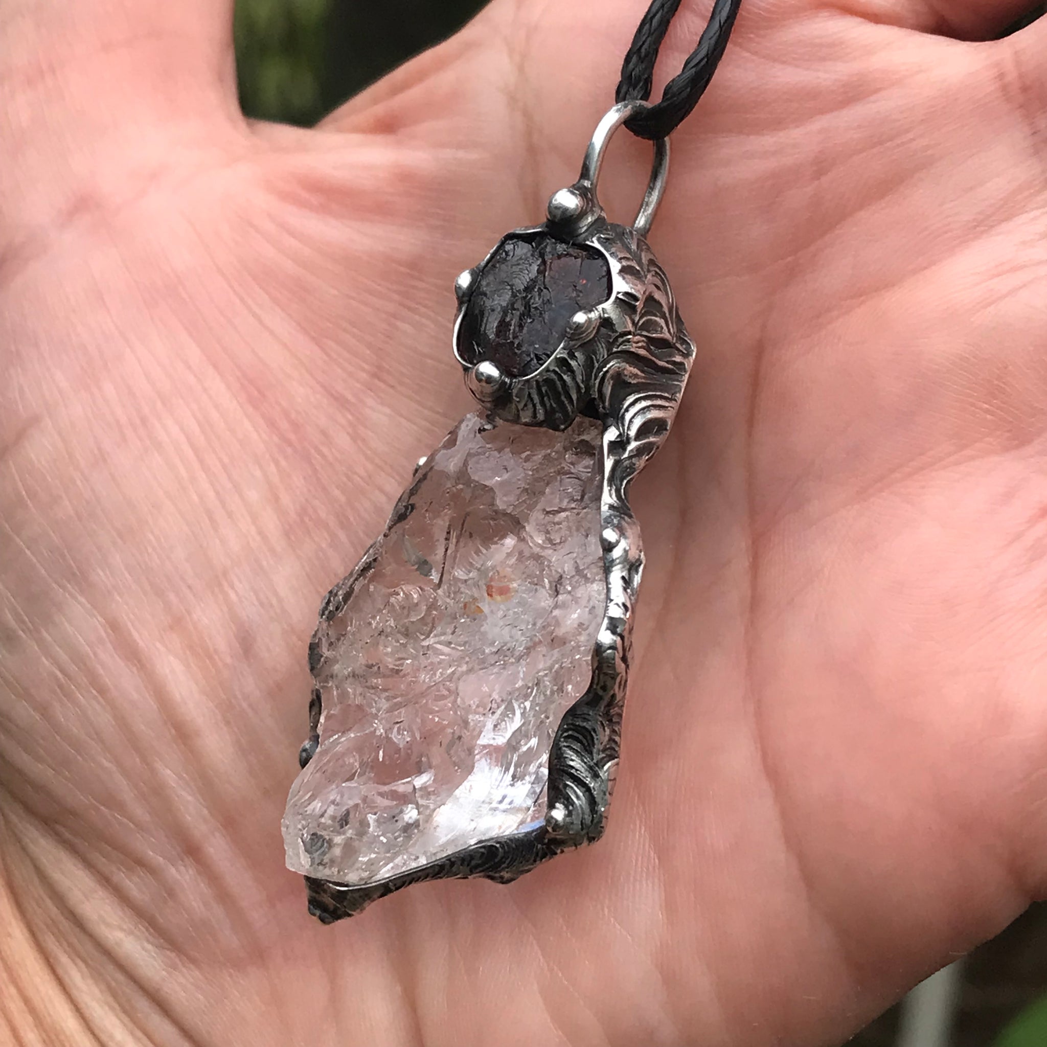 Rough Clear Quartz pendant with mineral inclusion and rainbow adorned with Australian Garnet♥️