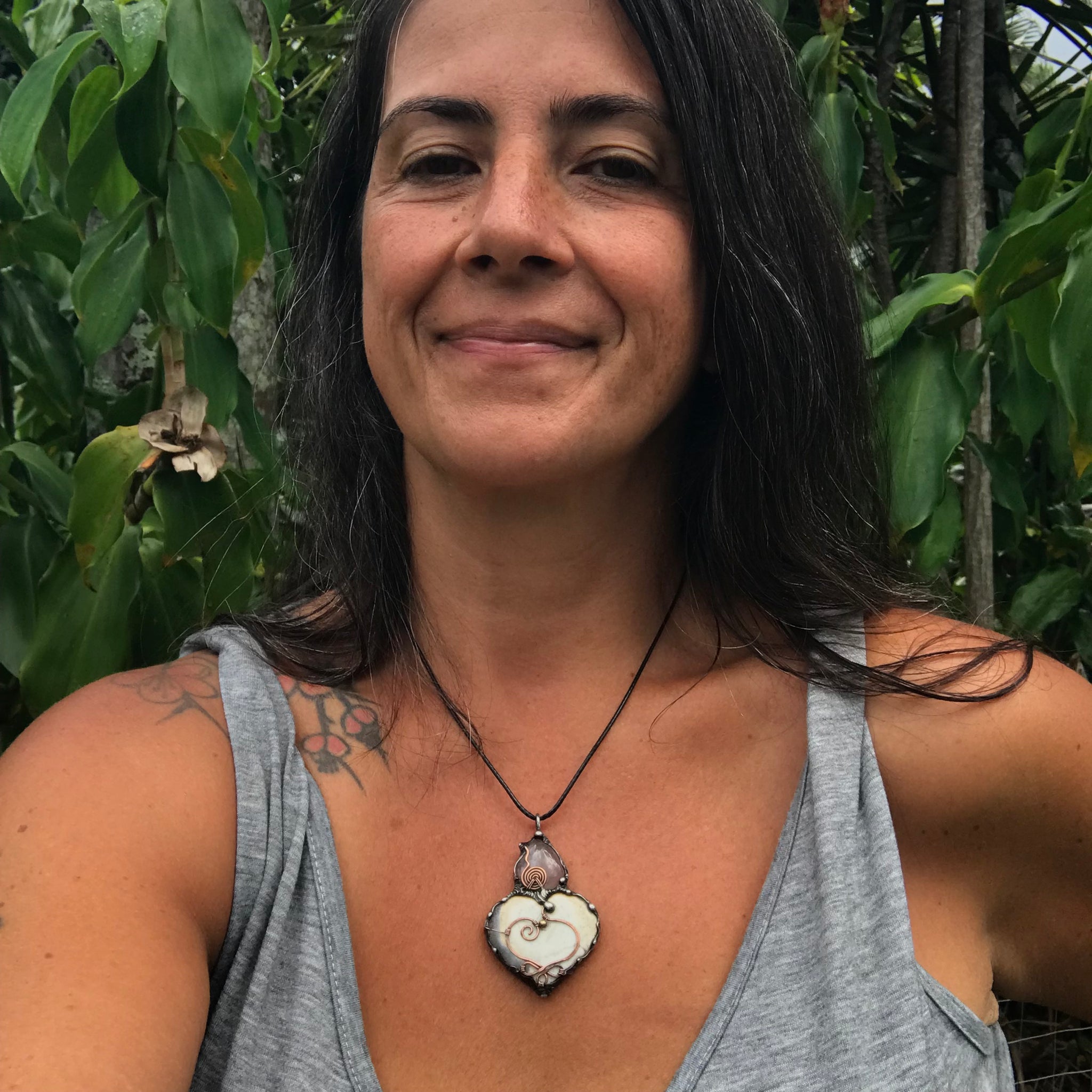 Solar Quartz heart/Rosequartz pendant adorned with a Celtic copper heart and spiral
