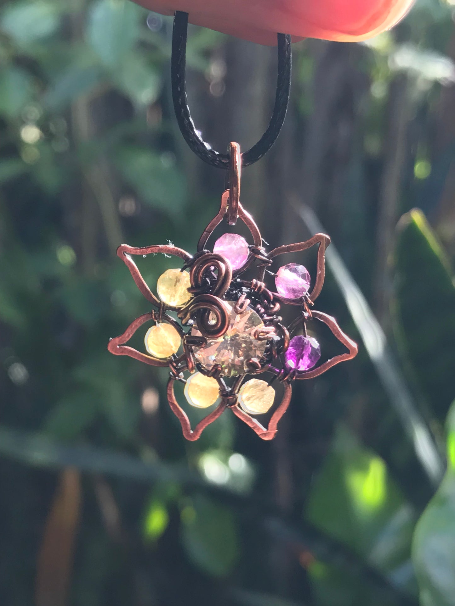Copper crafted lotus flower pendant with Rainbow Fluorite
