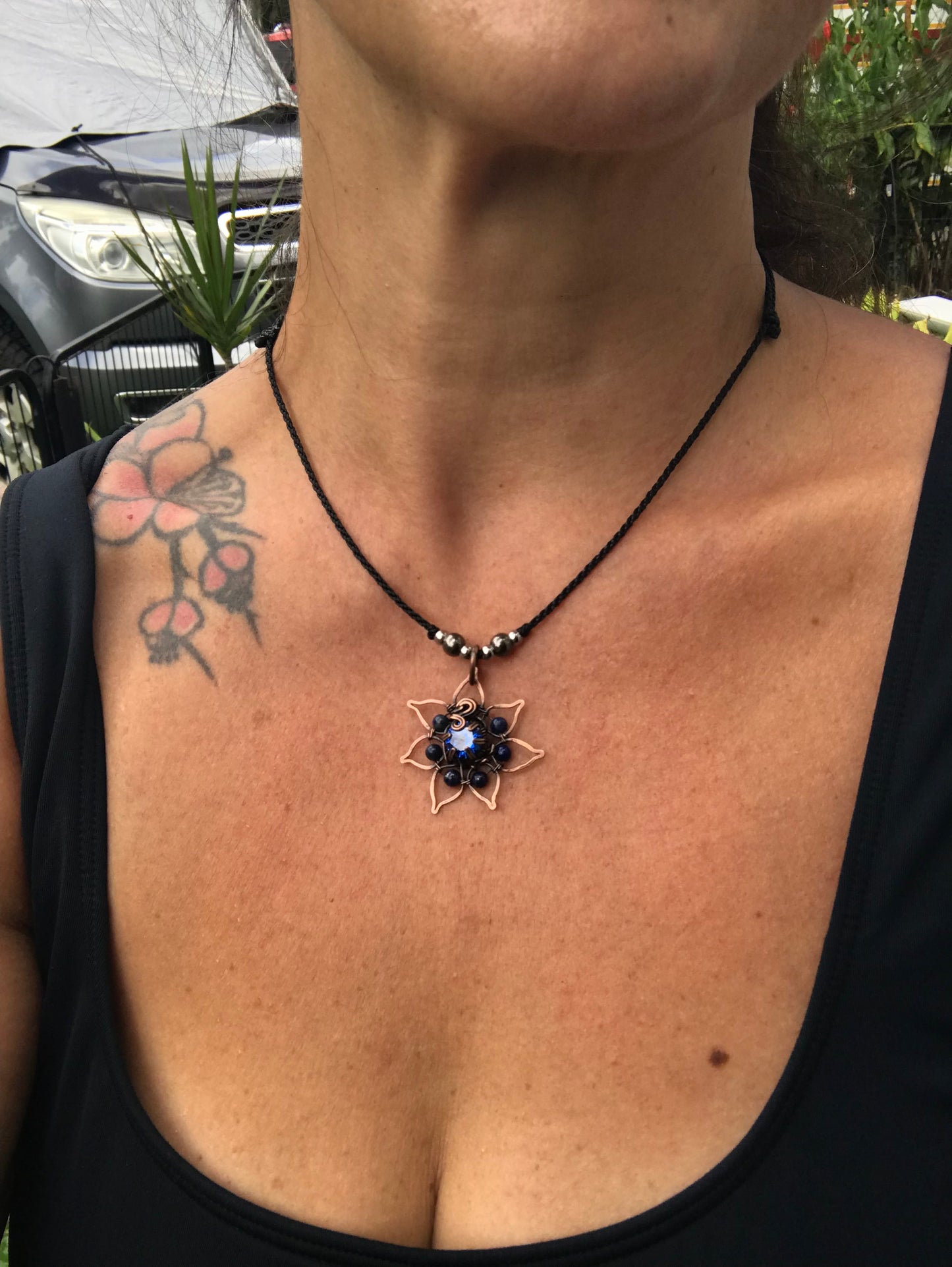 Copper crafted lotus flower pendant with Lapis Lazuli