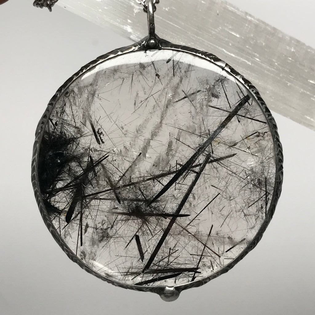 Spectacular and unique Tourmalinated Quartz statement disc pendant