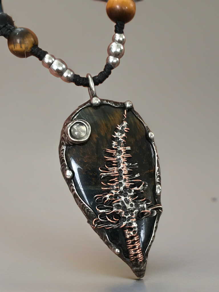 Bespoke magical tree on Blue Tiger eye crystal pendant adorned with Moonstone