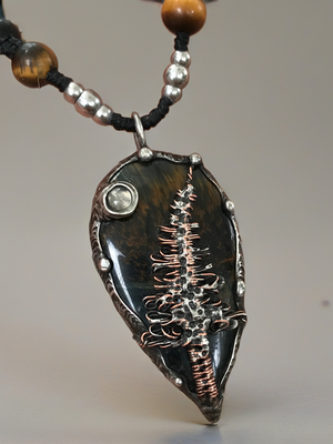 Bespoke magical tree on Blue Tiger eye crystal pendant adorned with Moonstone