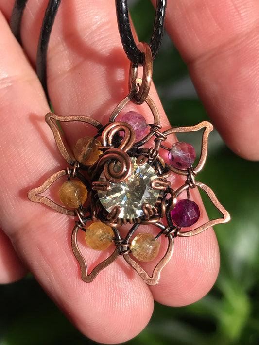 Copper crafted lotus flower pendant with Rainbow Fluorite