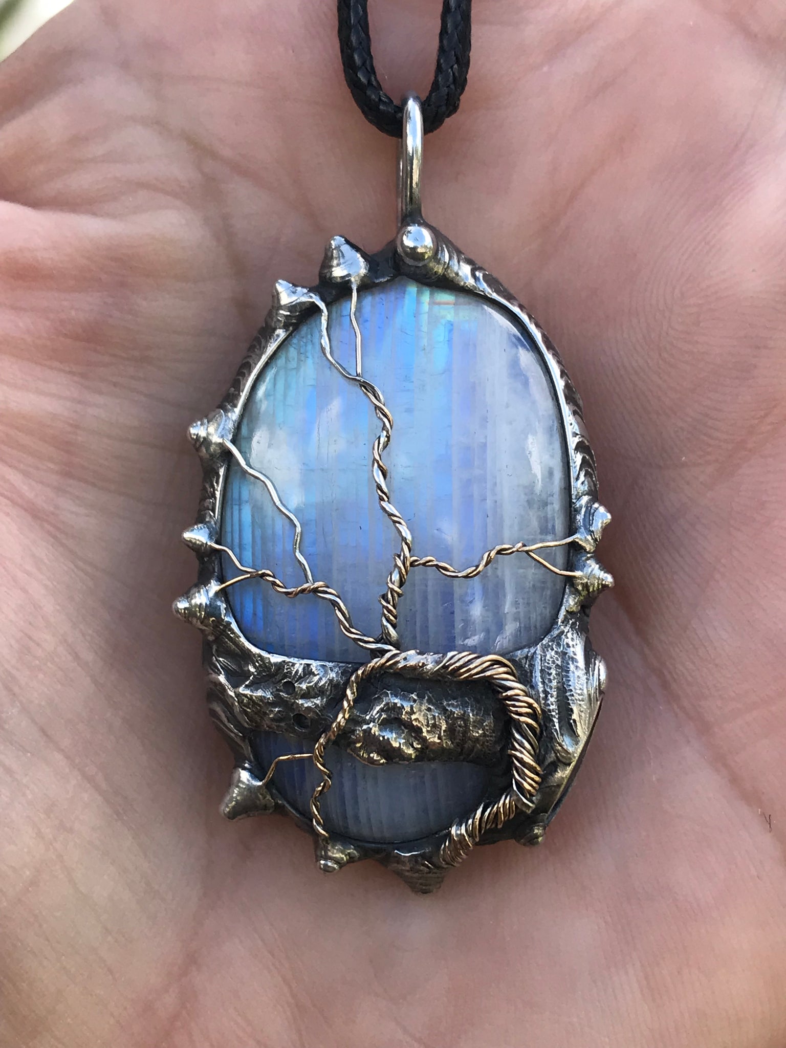 Rainbow Moonstone adorned with gold and sterling silver tree of life