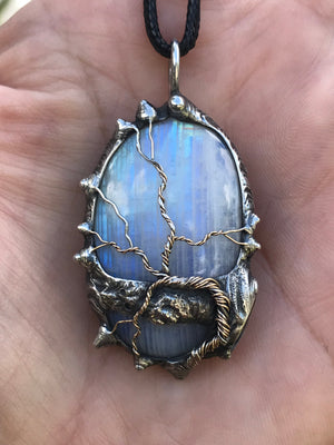 Rainbow Moonstone adorned with gold and sterling silver tree of life