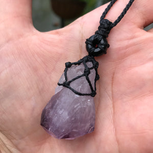 Rough Amethyst Point and black onyx wrapped in Linhasita