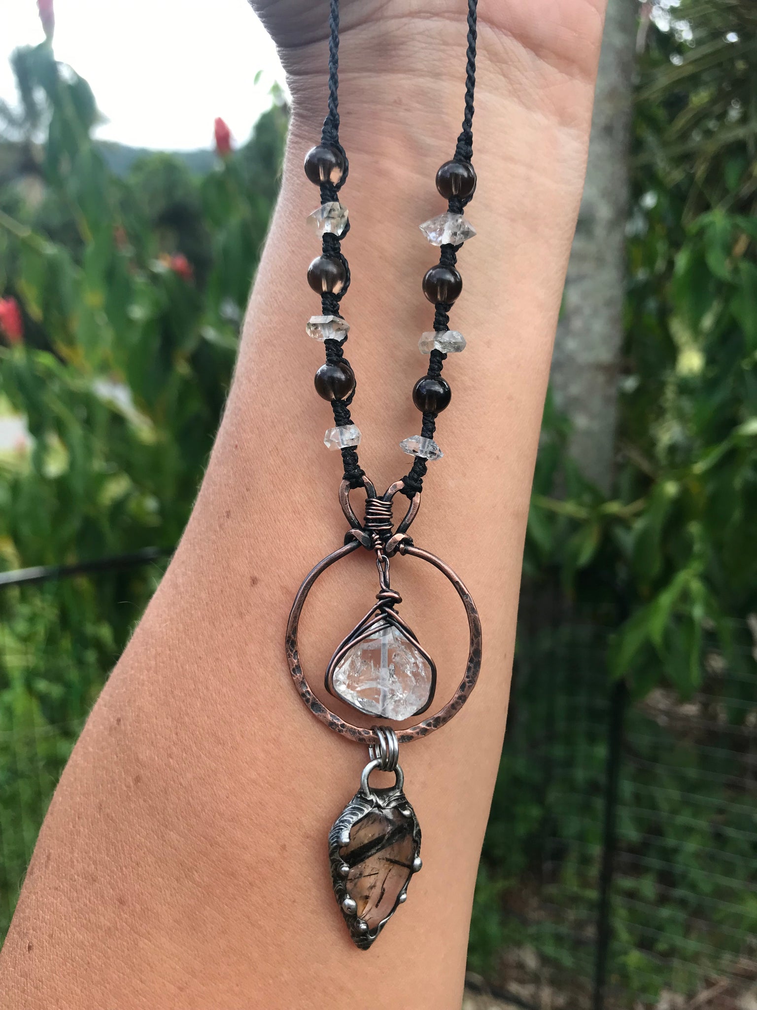 Hammered copper pendant with Herkimer diamond crystal, Tourmalinated and smoky quartz