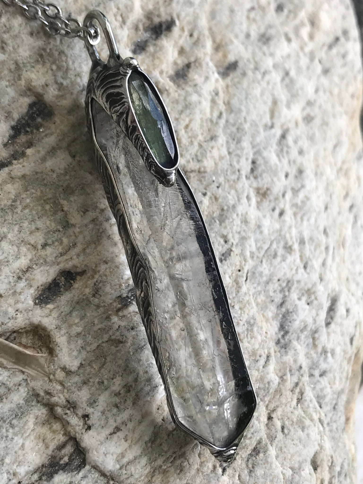 Clear Quartz crystal point with green faceted kyanite