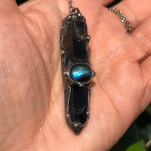 Aegirine and smoky Quartz point adorned with labradorite and rainbow moonstone