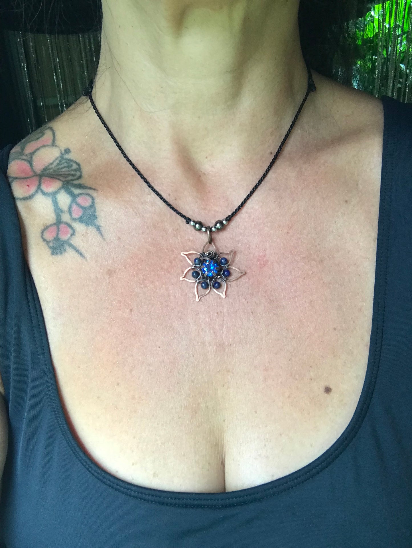 Copper crafted lotus flower pendant with Lapis Lazuli