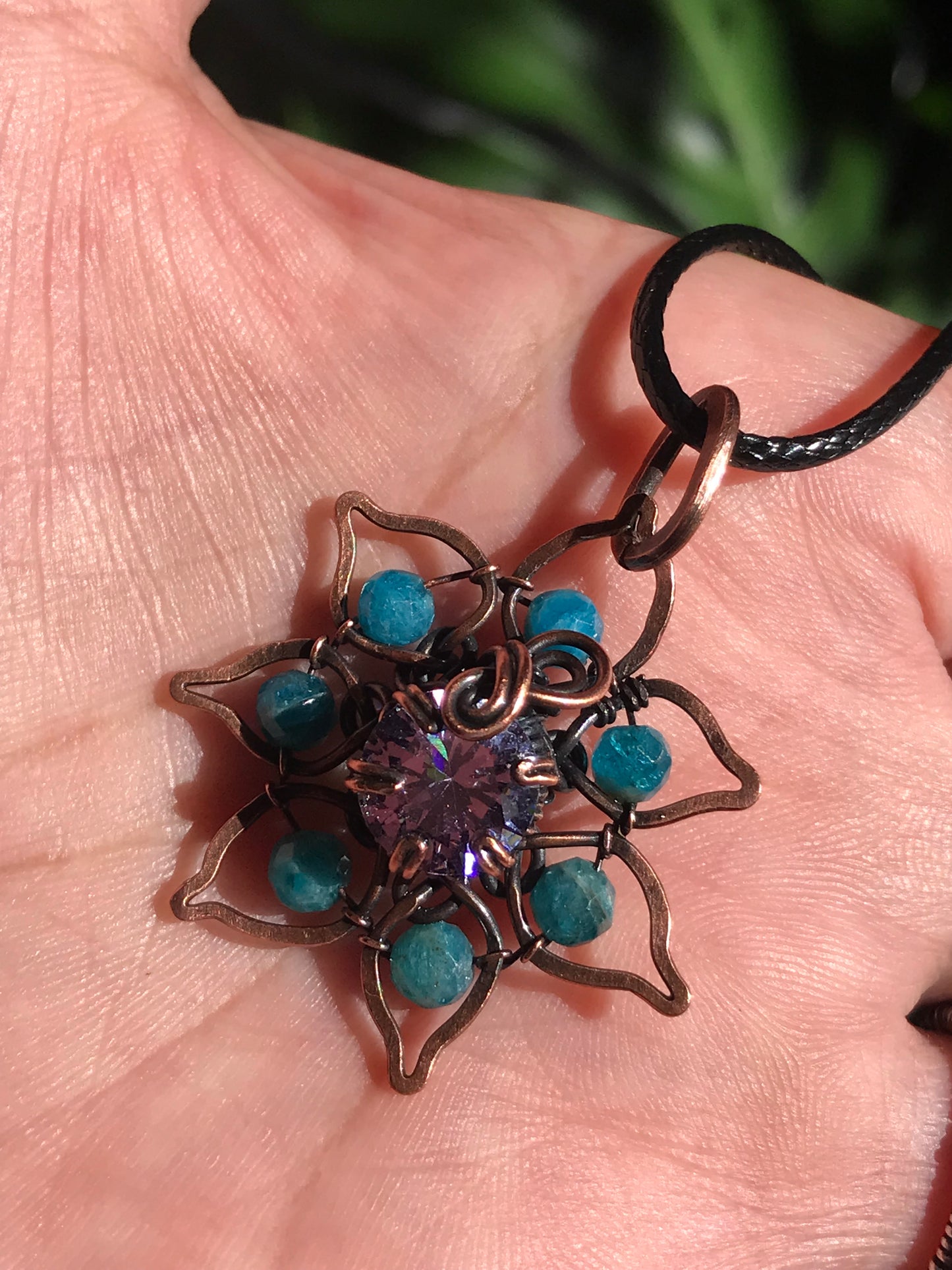 Copper crafted lotus flower pendant with Apatite