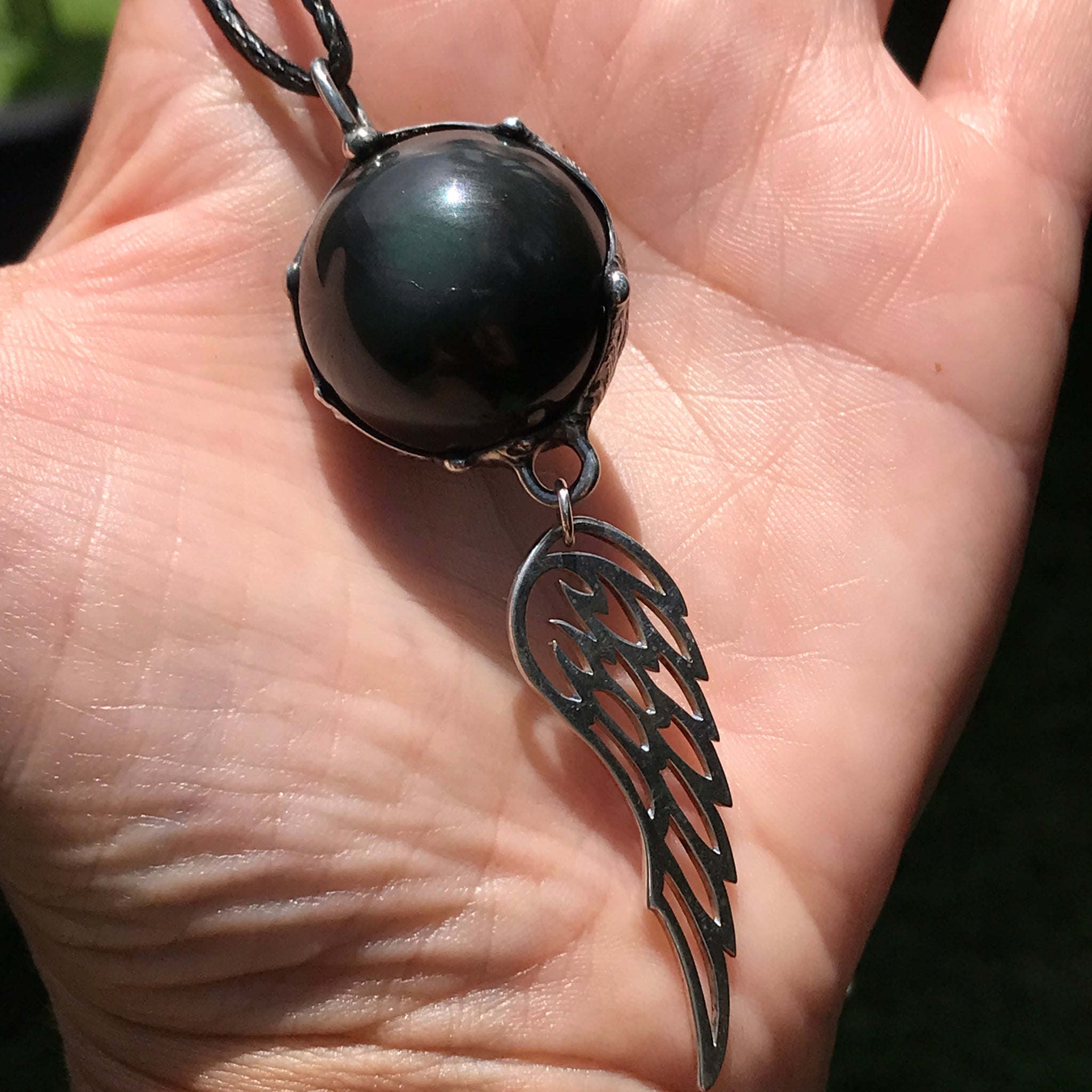 Rainbow Obsidian dream Sphere with sterling silver wing