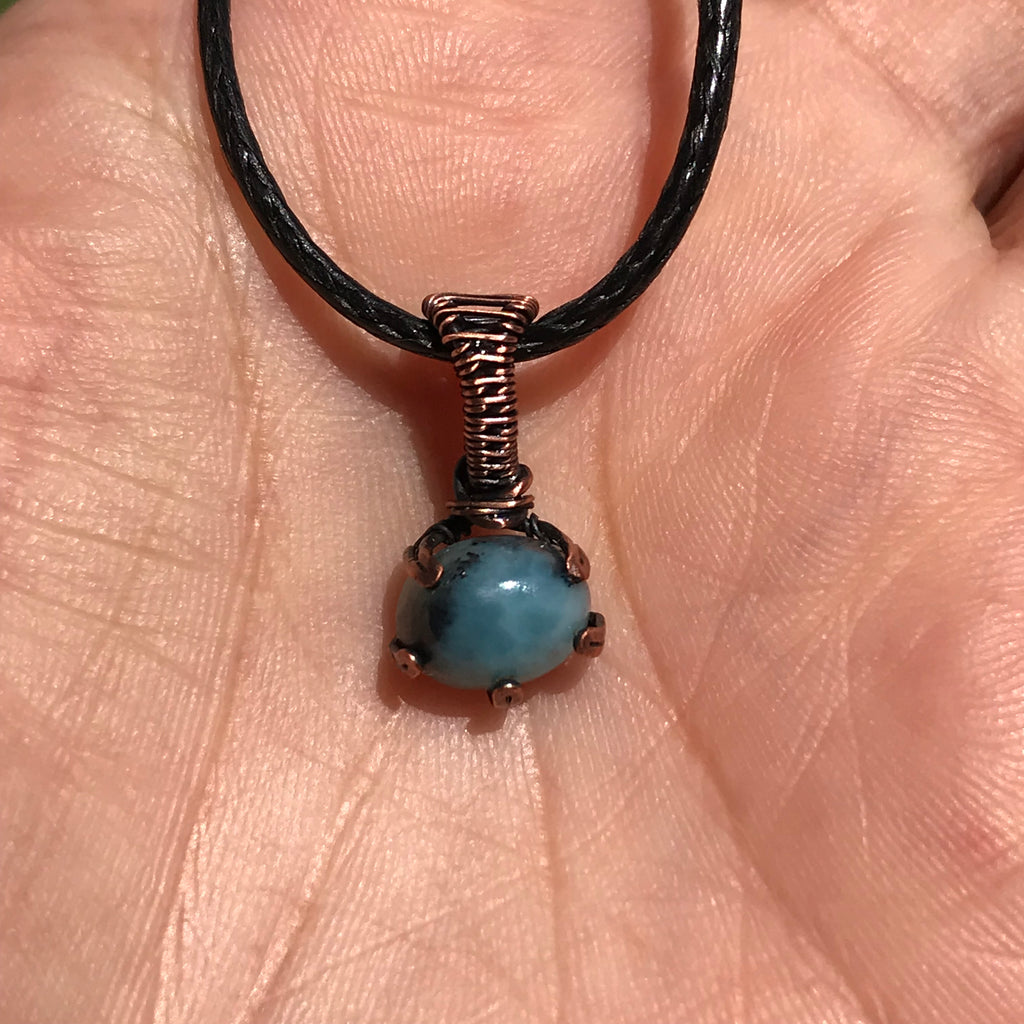 Wire wrapped Larimar crystal claw pendant