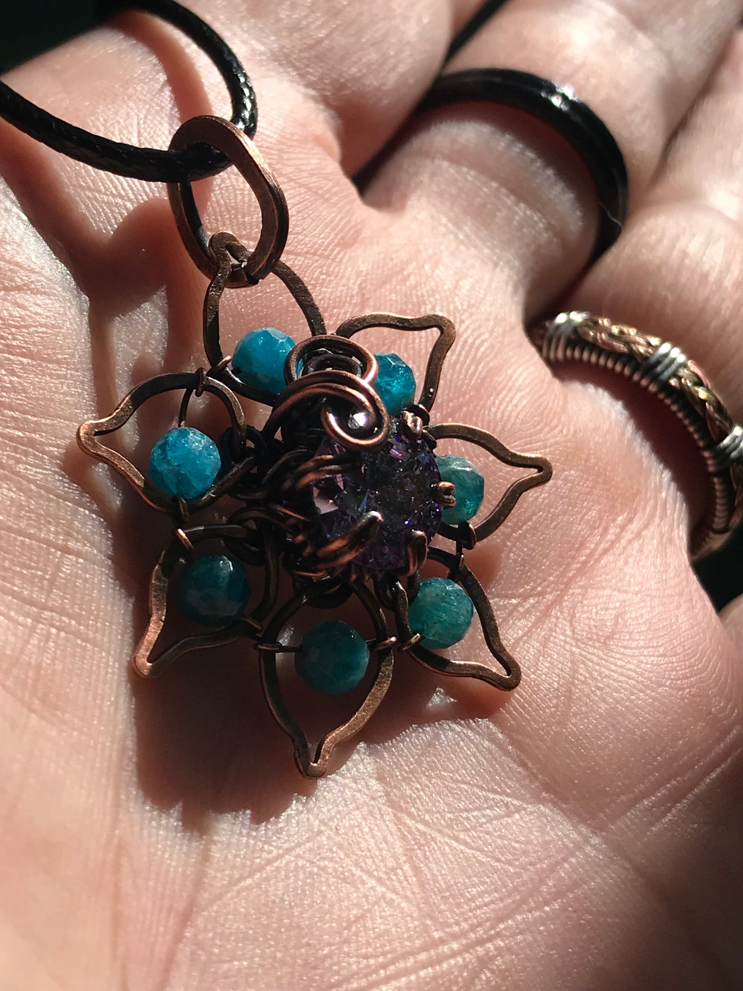 Copper crafted lotus flower pendant with Apatite