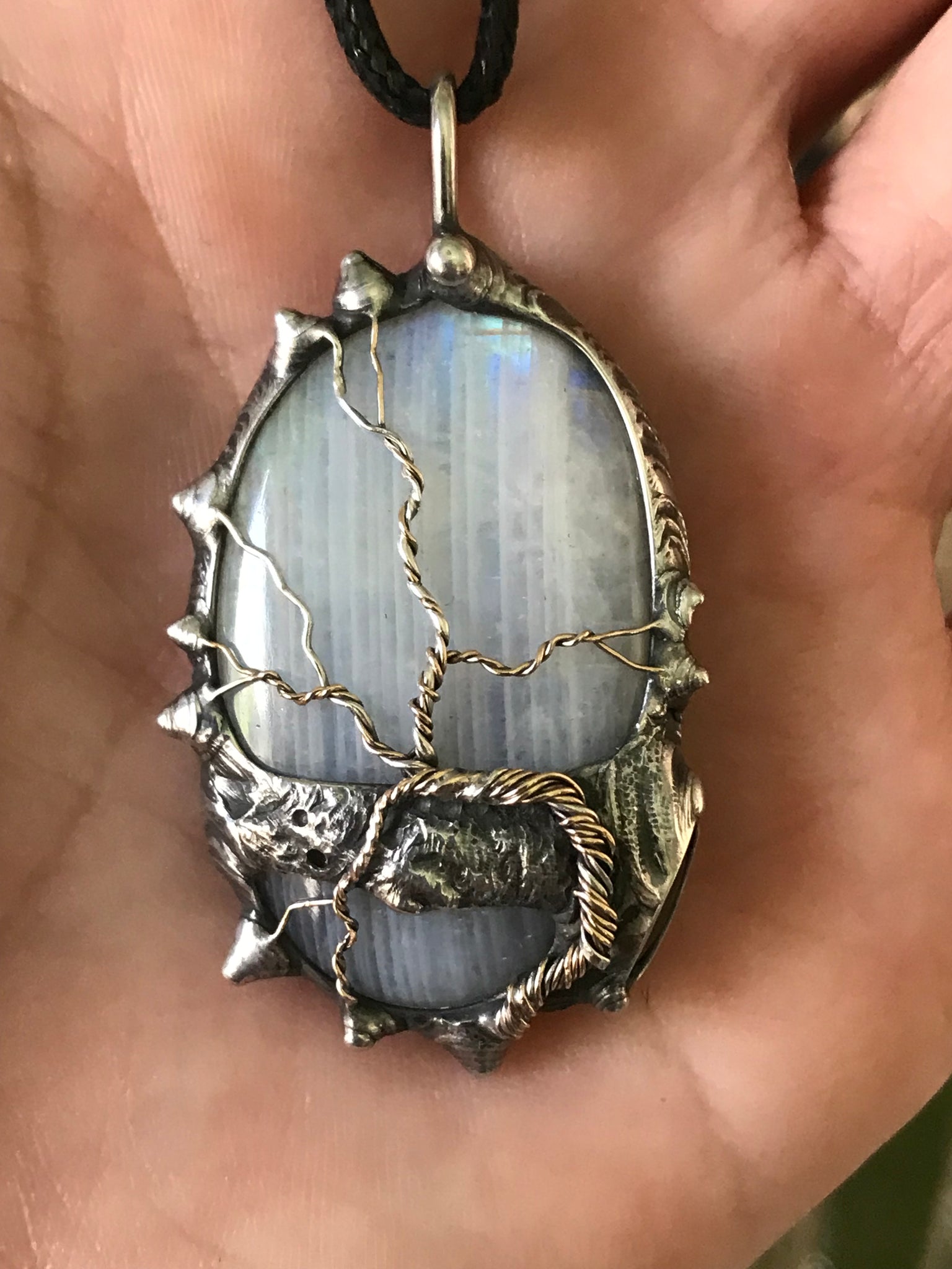 Rainbow Moonstone adorned with gold and sterling silver tree of life