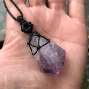 Rough Amethyst Point and black onyx wrapped in Linhasita