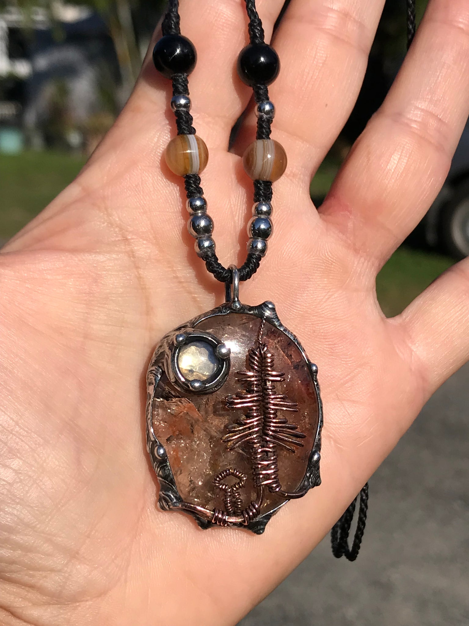 Bespoke tree landscape on hematite Quartz adorned with a mystical opalite moon
