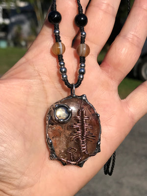 Bespoke tree landscape on hematite Quartz adorned with a mystical opalite moon