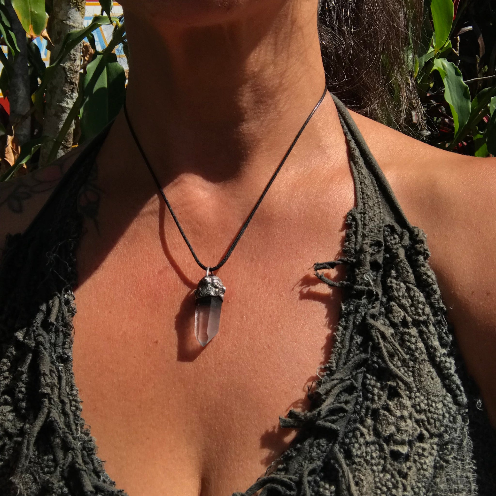 Lemurian seed crystal adorned with Amethyst