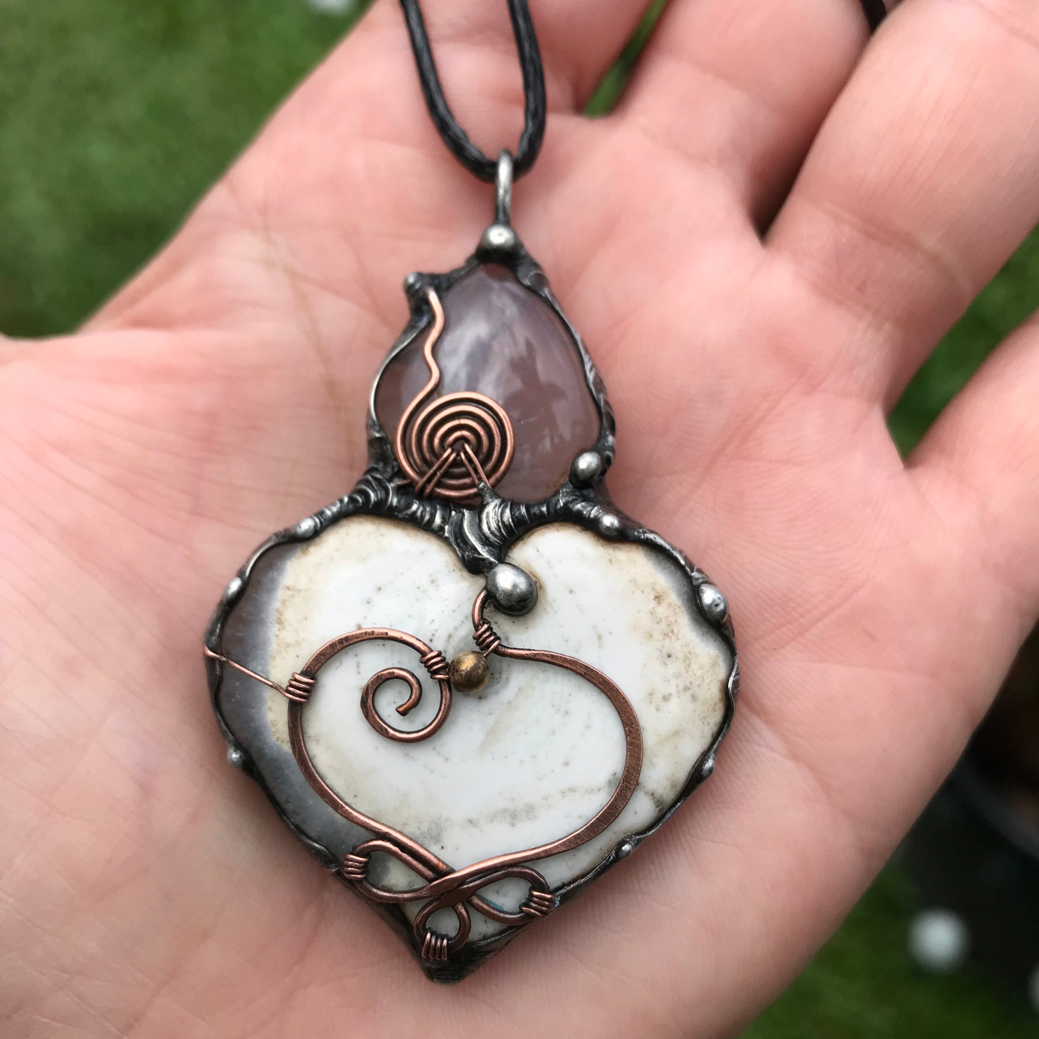 Solar Quartz heart/Rosequartz pendant adorned with a Celtic copper heart and spiral