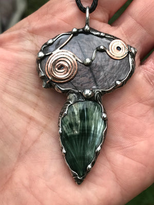 Double spiralled Hypersthene and Seraphinite pendant
