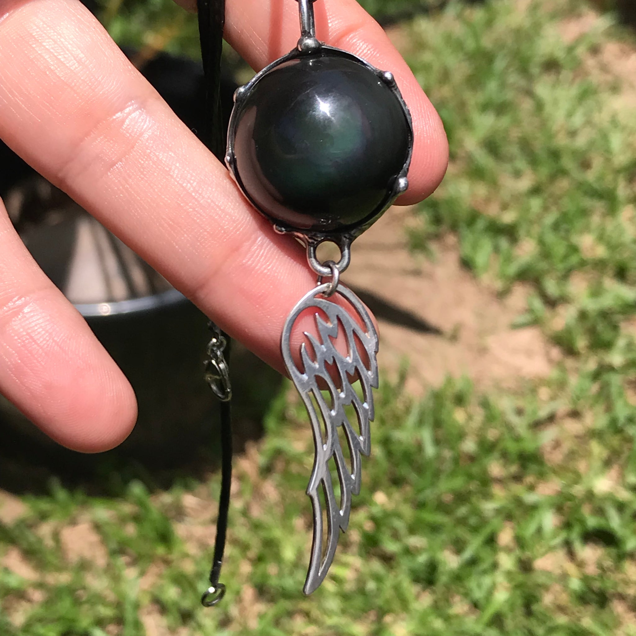 Rainbow Obsidian dream Sphere with sterling silver wing