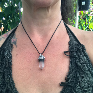Lemurian seed crystal adorned with Amethyst