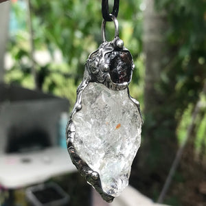 Rough Clear Quartz pendant with mineral inclusion and rainbow adorned with Australian Garnet♥️