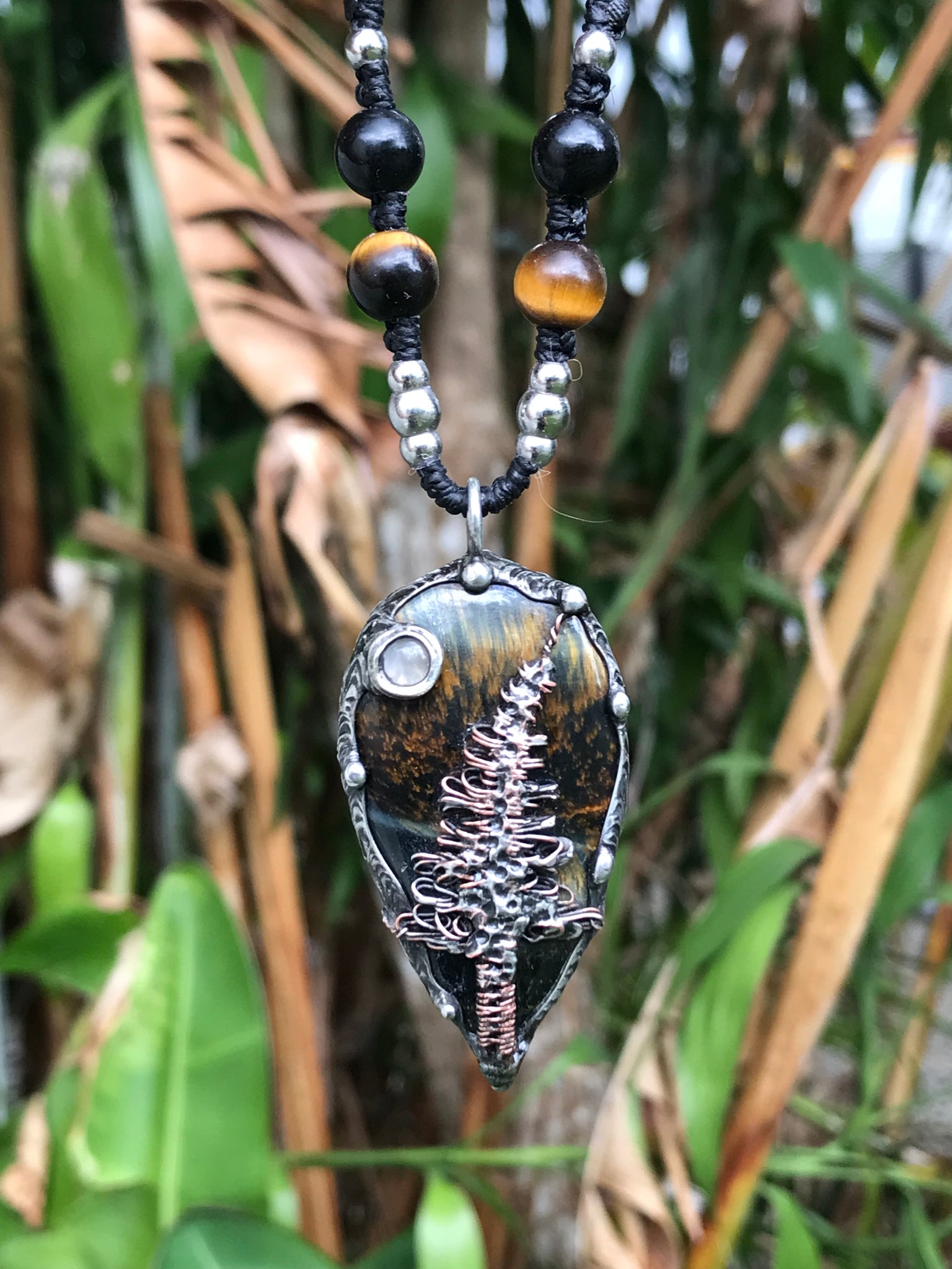 Bespoke magical tree on Blue Tiger eye crystal pendant adorned with Moonstone
