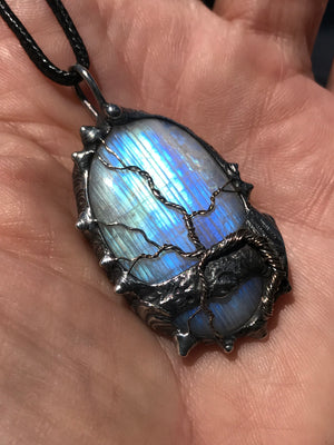 Rainbow Moonstone adorned with gold and sterling silver tree of life