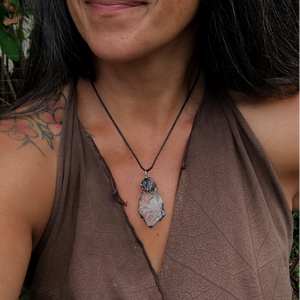 Rough Clear Quartz pendant with mineral inclusion and rainbow adorned with Australian Garnet♥️