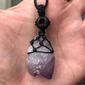 Rough Amethyst Point and black onyx wrapped in Linhasita