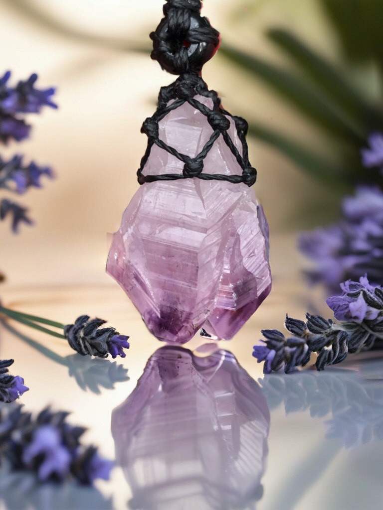 Rough Amethyst Point and black onyx wrapped in Linhasita