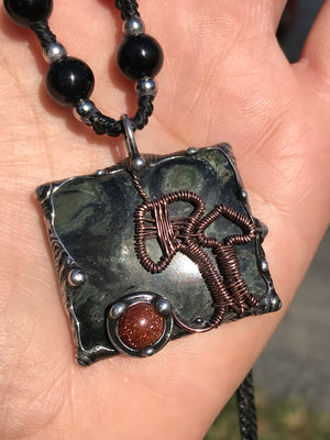 Kambaba Jasper with giant mushrooms (Prototaxites) and goldstone portal