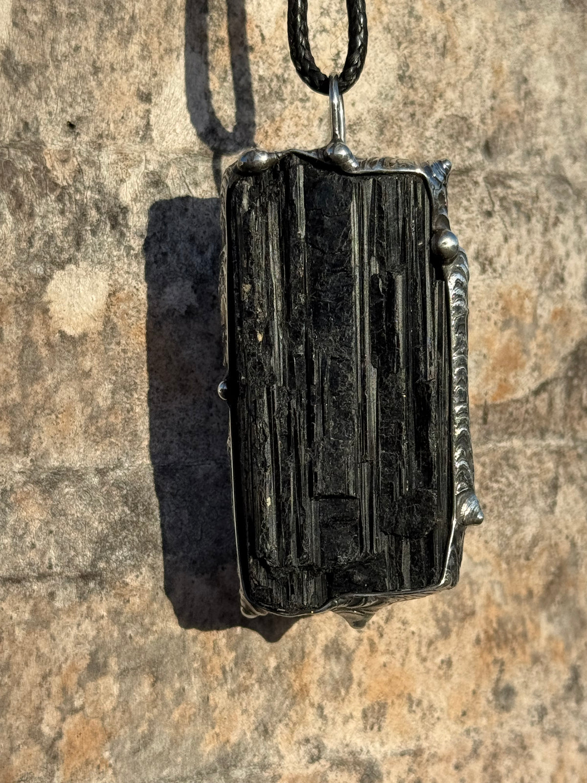 Black striated Tourmaline pendant