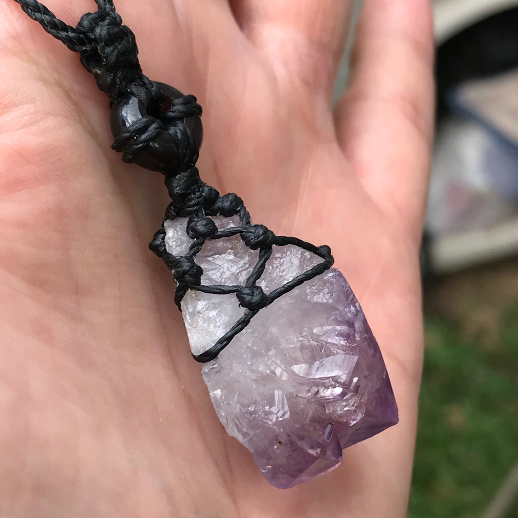 Rough Amethyst Point and black onyx wrapped in Linhasita