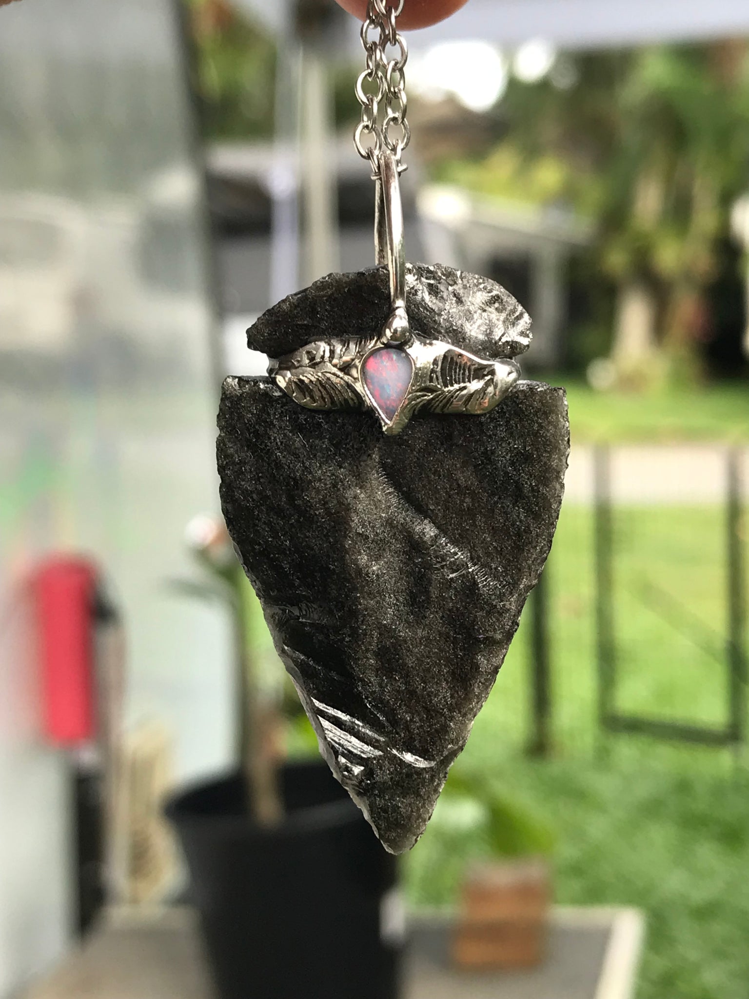 Silversheen Obsidian Arrowhead adorned with lightning ridge Opal
