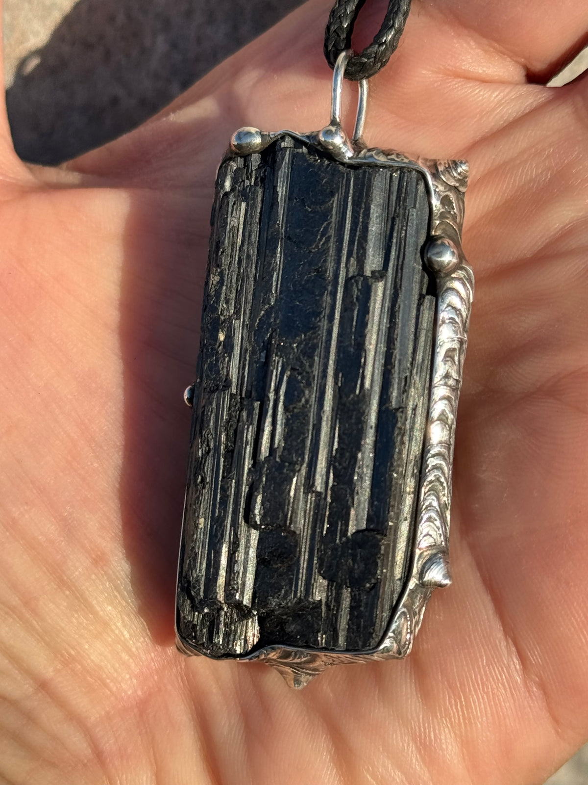 Black striated Tourmaline pendant